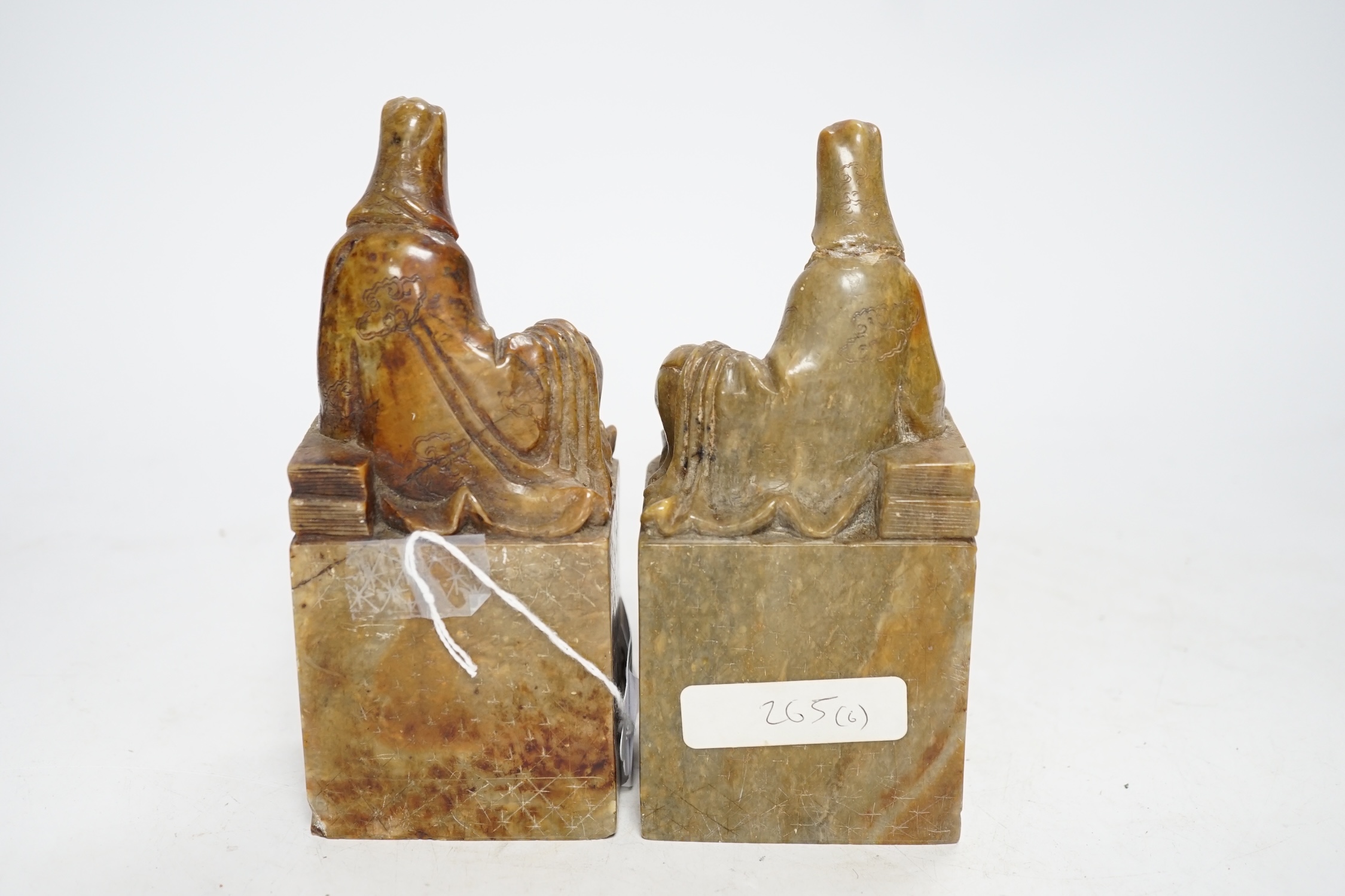 A pair of large Chinese soapstone ‘Guanyin’ seals, 16.5cm high